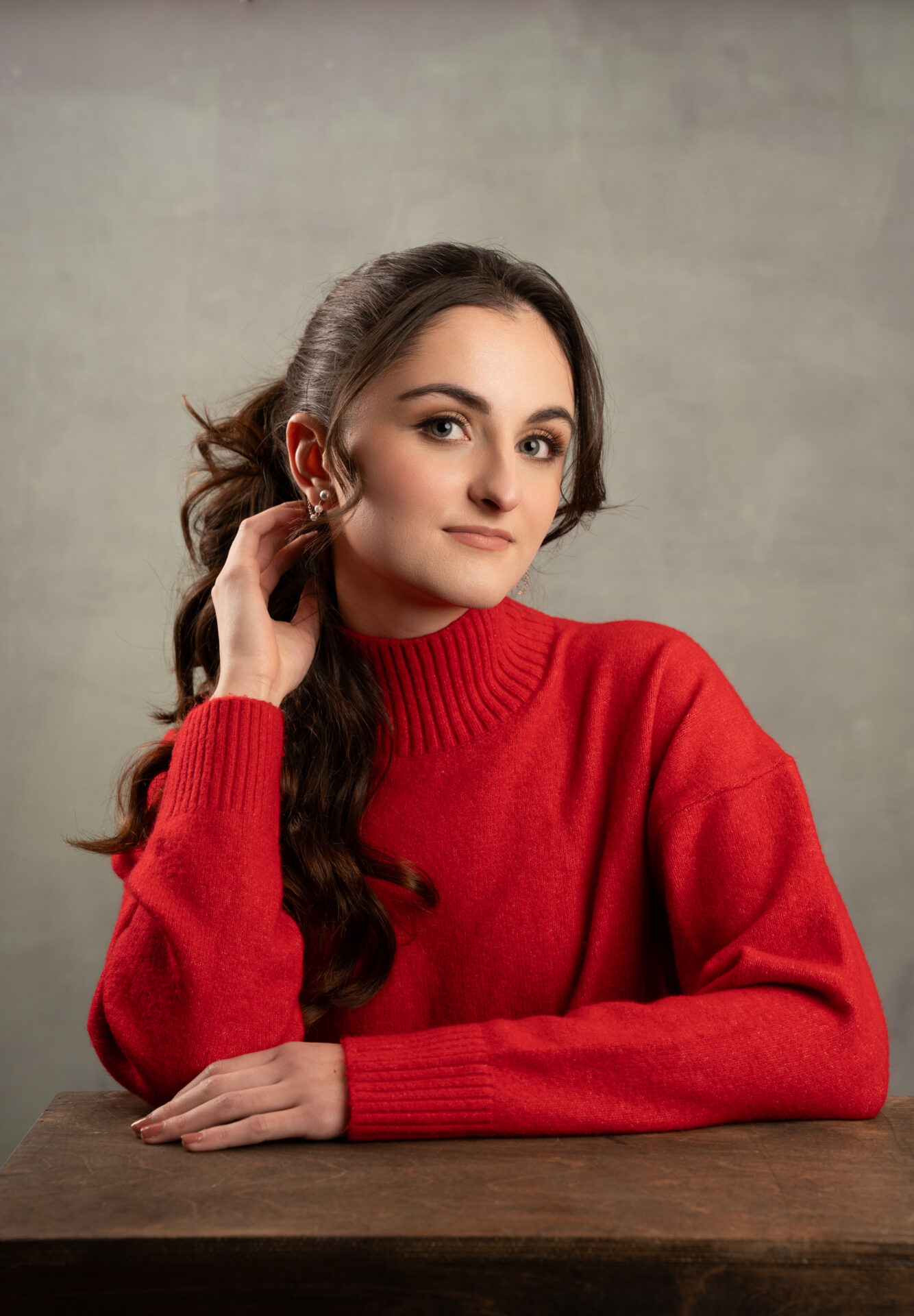 college graduate posing for acting headshot in long island nassau county photo studio