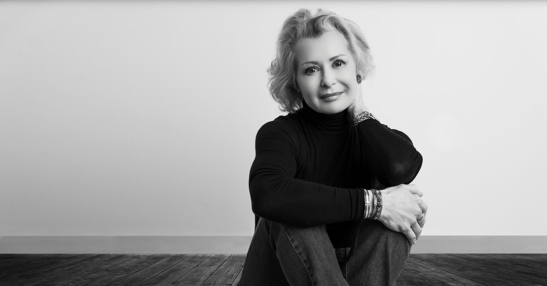 Woman in black turtleneck posing for a luxury personal branding portrait on Long Island by The BeVard Studio